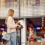 Beautiful girl standing in a airport