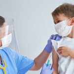Picture of adorable little boy having doctor’s appointment