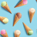 Colorful ice cream pattern on blue background, top view, flat lay