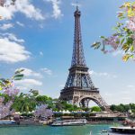 eiffel tour over Seine river waters at spring day, Paris, France