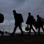 Refugees and migrants gather at the Turkish-Greek land border