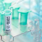 Corona virus: vial with pipette in laboratory