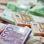 lots of euro bills on the table