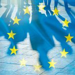 EU Flag and shadows of People concept picture