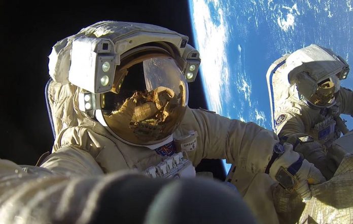Russian cosmonauts perform longest spacewalk outside International Space Station
