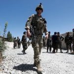 FILE PHOTO: An U.S. soldier keeps watch at an Afghan National Army (ANA) base in Logar province, Afghanistan