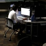 A student sits in front of a computer while demonstrating softwares during an interview with Reuters at War Room at The Korea University in Seoul