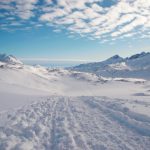 Landscape of Greenland with mountains and footprints