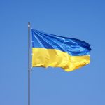 Ukrainian flag on blue sky backgroud