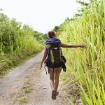 woman walking through fields