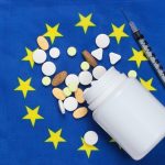 syringe-pills-with-euro-union-flag-vaccination-medicine_175682-15876