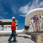 Male,Worker,Inspection,At,Steel,Long,Pipes,And,Pipe,Elbow