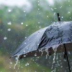 its-raining-heavily-wearing-an-umbrella-during-the-royalty-free-image-1660153348