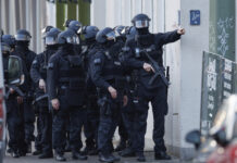 Четирима са ранени при стрелба в Германия, предполагаемо свързана с процес за убийство